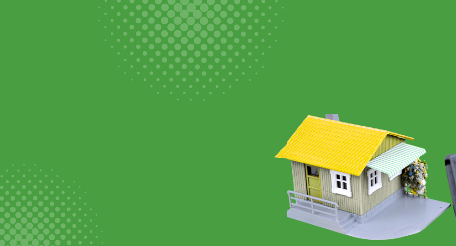 Vivienda y calculadora que representan un abono a capital de un crédito hipotecario